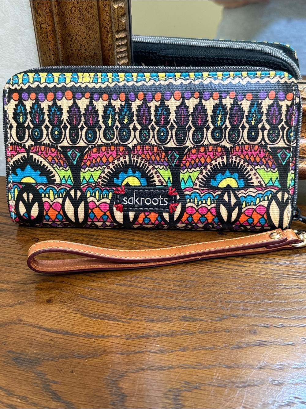 NWOT Sakroots Colorful Wristlet Wallet w/peace symbols and embroided elephant.